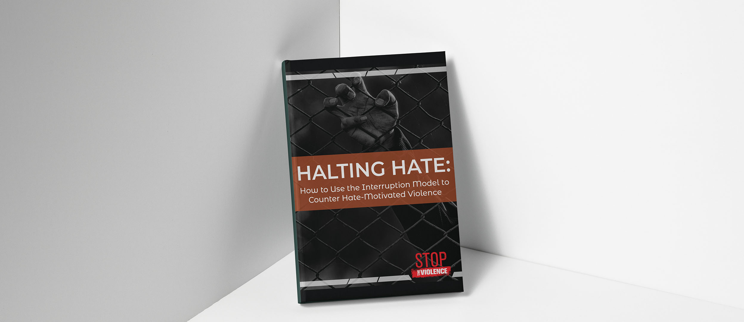 Report cover with a fence and a hand